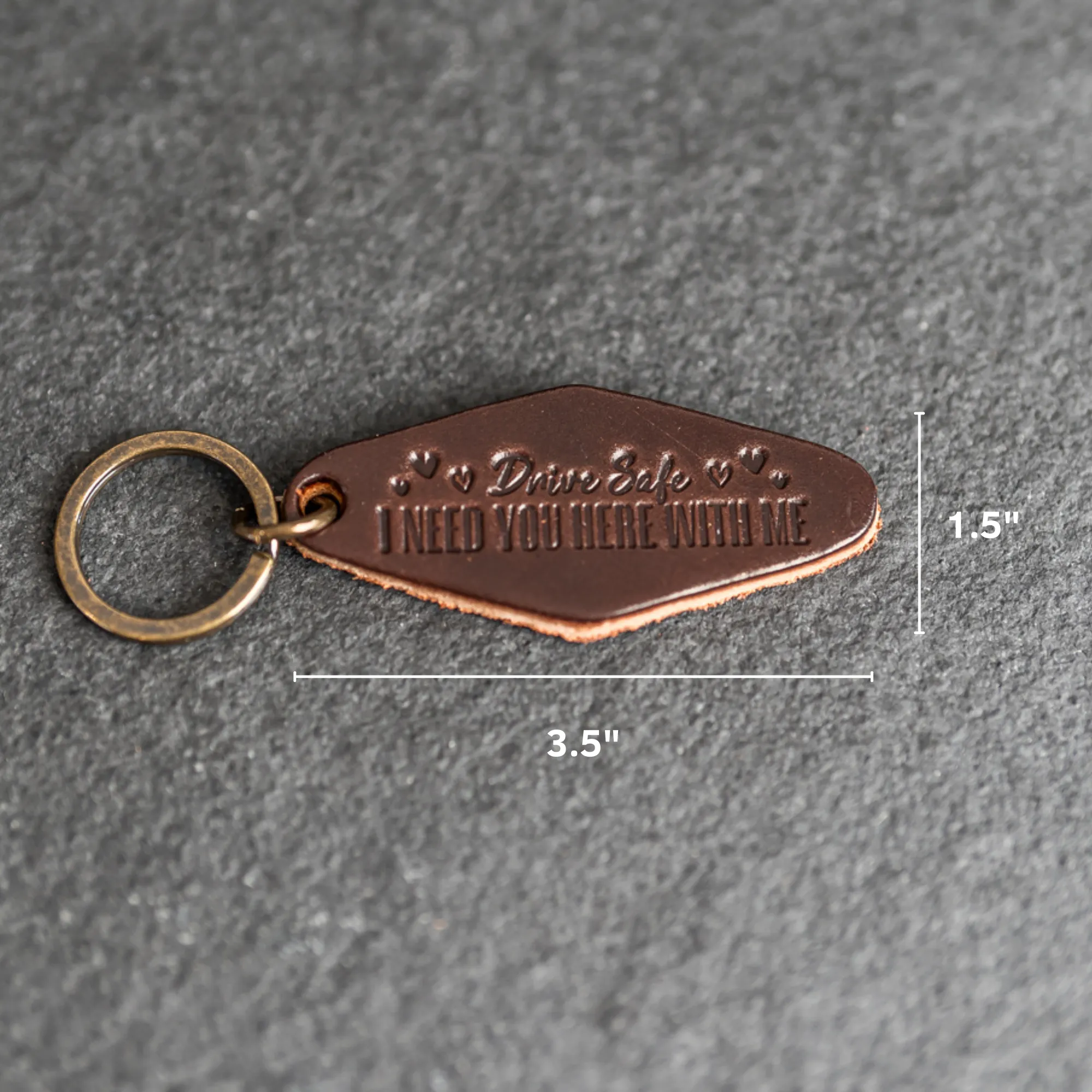 Leather Motel Key Shape Keychain with a Drive Safe Stamp Design